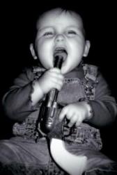 baby with gun in its mouth